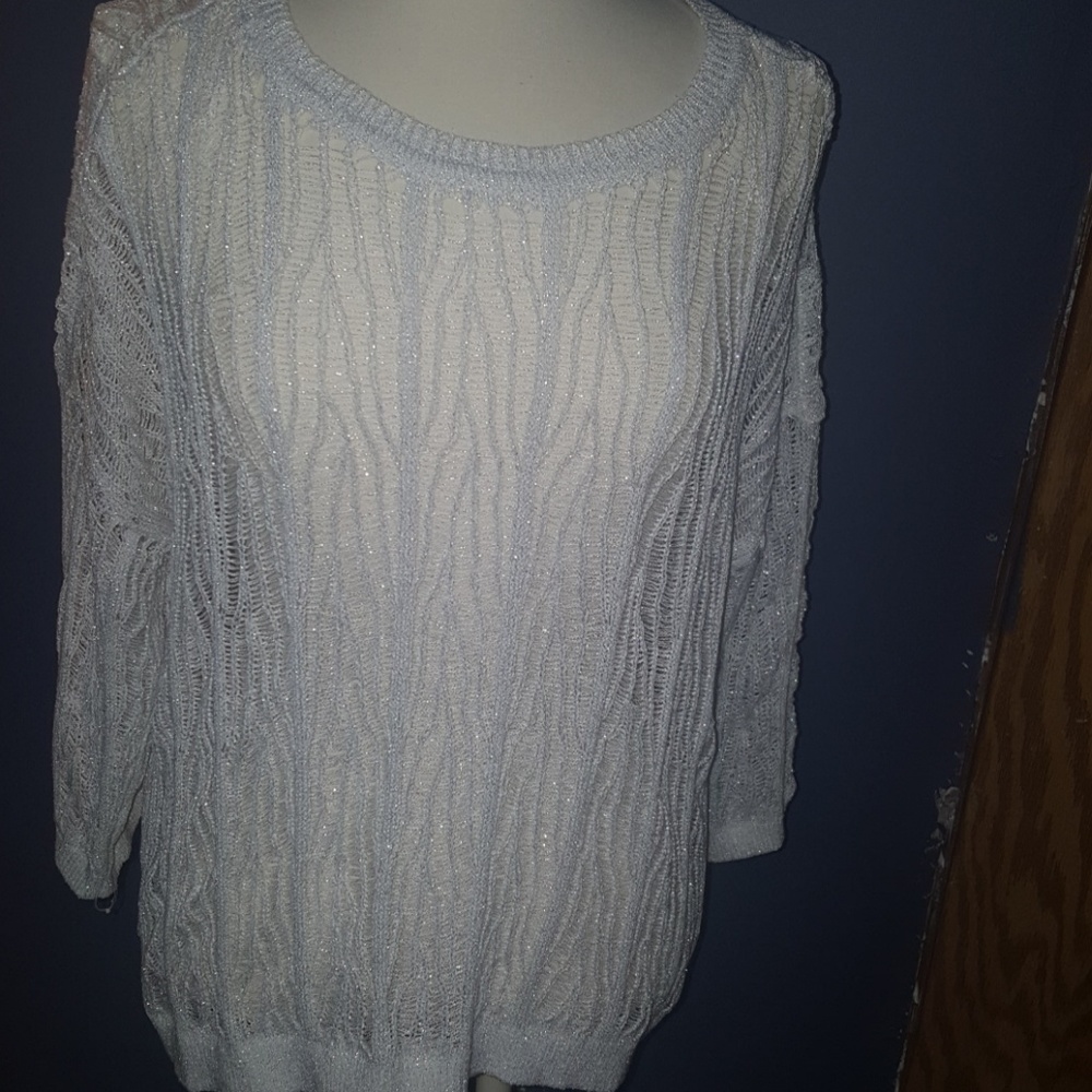Jennifer Lopez glittery shimmer holey sweater